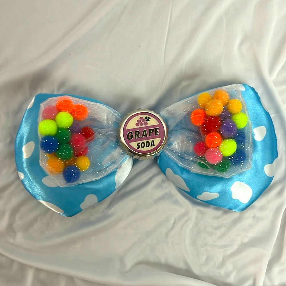 DISNEY PARKS Grape Soda Pin (from “Up”) Clip-on Bow